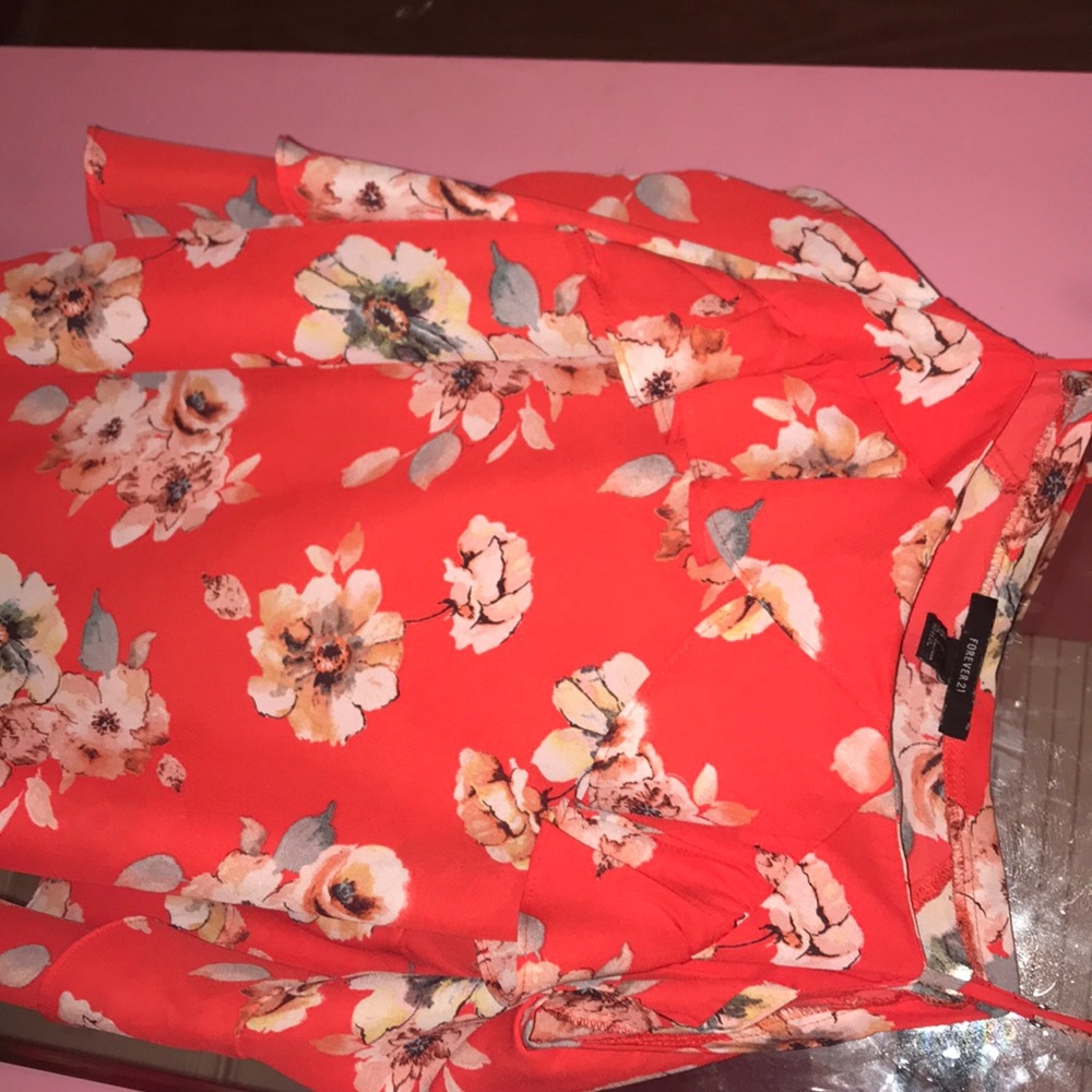 Orange with flowers off the shoulders shirt